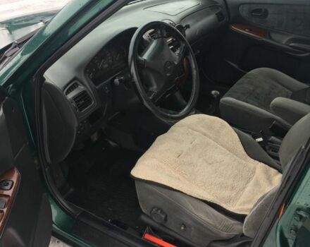 Зеленый Мазда 626, объемом двигателя 2 л и пробегом 320 тыс. км за 2700 $, фото 2 на Automoto.ua