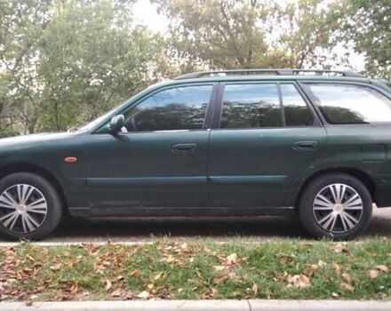 Зеленый Мазда 626, объемом двигателя 1.8 л и пробегом 435 тыс. км за 3500 $, фото 3 на Automoto.ua