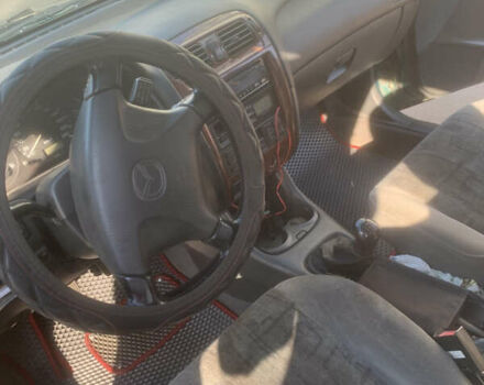 Зелений Мазда 626, об'ємом двигуна 2 л та пробігом 150 тис. км за 2500 $, фото 8 на Automoto.ua