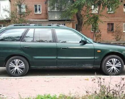 Зеленый Мазда 626, объемом двигателя 1.8 л и пробегом 435 тыс. км за 3500 $, фото 4 на Automoto.ua