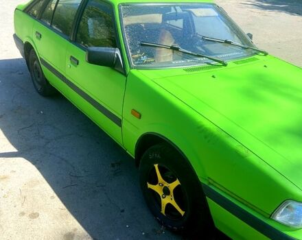 Зелений Мазда 626, об'ємом двигуна 2 л та пробігом 400 тис. км за 1200 $, фото 1 на Automoto.ua