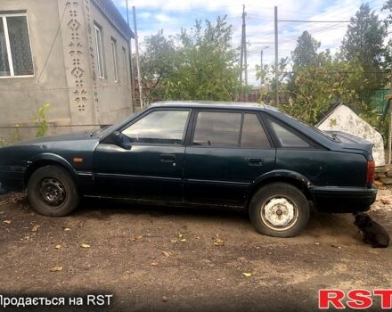 Зелений Мазда 626, об'ємом двигуна 2 л та пробігом 367 тис. км за 650 $, фото 1 на Automoto.ua