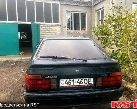 Зелений Мазда 626, об'ємом двигуна 2 л та пробігом 367 тис. км за 650 $, фото 4 на Automoto.ua