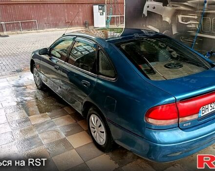 Зелений Мазда 626, об'ємом двигуна 2 л та пробігом 600 тис. км за 1600 $, фото 1 на Automoto.ua