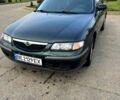 Зеленый Мазда 626, объемом двигателя 2 л и пробегом 300 тыс. км за 2700 $, фото 1 на Automoto.ua