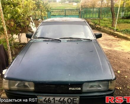 Зеленый Мазда 626, объемом двигателя 2 л и пробегом 367 тыс. км за 650 $, фото 1 на Automoto.ua