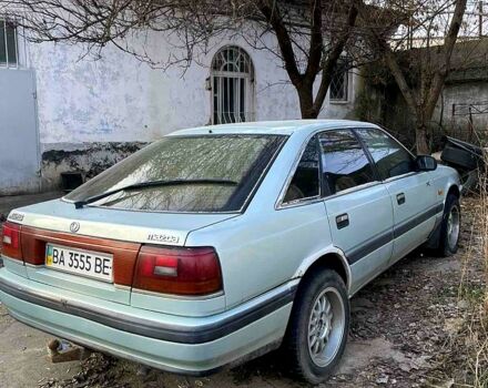 Зеленый Мазда 626, объемом двигателя 2 л и пробегом 220 тыс. км за 1350 $, фото 1 на Automoto.ua