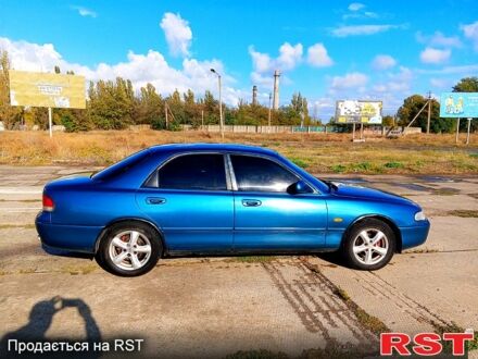 Зеленый Мазда 626, объемом двигателя 1.8 л и пробегом 350 тыс. км за 1750 $, фото 1 на Automoto.ua