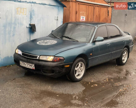 Зеленый Мазда 626, объемом двигателя 1.8 л и пробегом 300 тыс. км за 1099 $, фото 1 на Automoto.ua