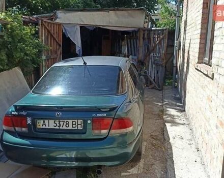 Зеленый Мазда 626, объемом двигателя 1.8 л и пробегом 300 тыс. км за 1500 $, фото 1 на Automoto.ua