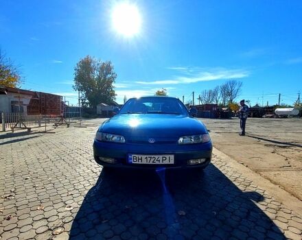 Зеленый Мазда 626, объемом двигателя 2 л и пробегом 250 тыс. км за 2300 $, фото 1 на Automoto.ua