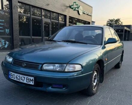 Зеленый Мазда 626, объемом двигателя 2 л и пробегом 200 тыс. км за 1199 $, фото 1 на Automoto.ua