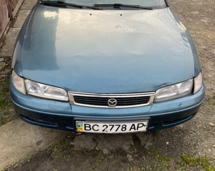 Зеленый Мазда 626, объемом двигателя 2 л и пробегом 470 тыс. км за 900 $, фото 1 на Automoto.ua