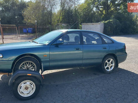 Зелений Мазда 626, об'ємом двигуна 2 л та пробігом 200 тис. км за 850 $, фото 1 на Automoto.ua