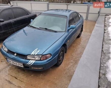 Зеленый Мазда 626, объемом двигателя 2 л и пробегом 400 тыс. км за 2000 $, фото 1 на Automoto.ua