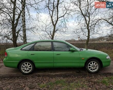 Зеленый Мазда 626, объемом двигателя 2 л и пробегом 531 тыс. км за 1500 $, фото 1 на Automoto.ua