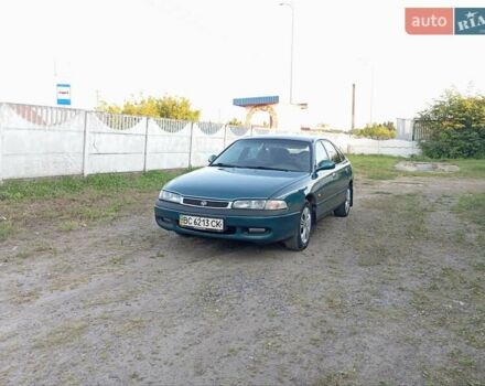 Зеленый Мазда 626, объемом двигателя 2 л и пробегом 401 тыс. км за 1800 $, фото 1 на Automoto.ua