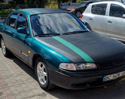 Зеленый Мазда 626, объемом двигателя 2 л и пробегом 252 тыс. км за 1499 $, фото 1 на Automoto.ua