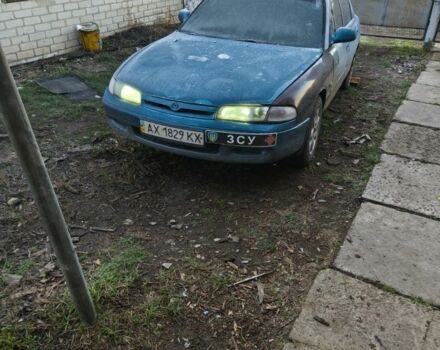 Зеленый Мазда 626, объемом двигателя 1.8 л и пробегом 330 тыс. км за 1000 $, фото 1 на Automoto.ua