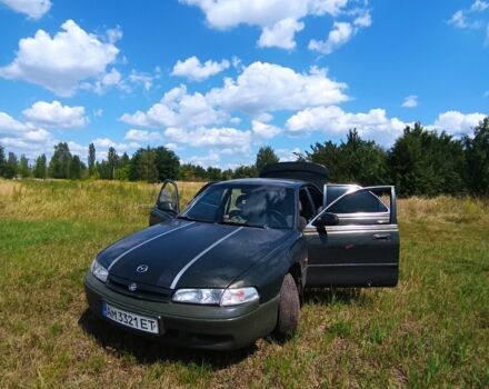 Зеленый Мазда 626, объемом двигателя 2 л и пробегом 365 тыс. км за 500 $, фото 1 на Automoto.ua