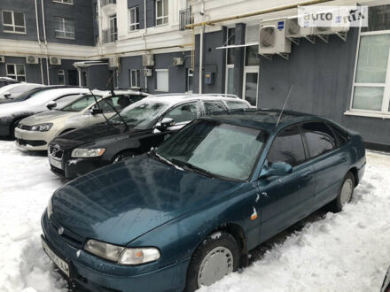 Зелений Мазда 626, об'ємом двигуна 2 л та пробігом 380 тис. км за 2000 $, фото 1 на Automoto.ua