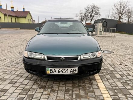 Зелений Мазда 626, об'ємом двигуна 2 л та пробігом 380 тис. км за 1450 $, фото 1 на Automoto.ua