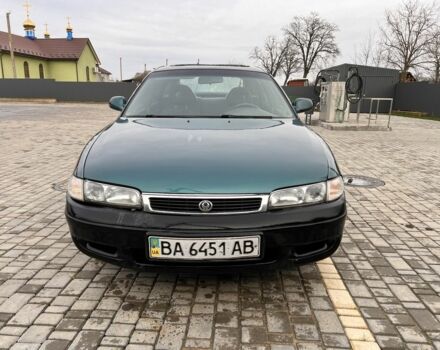 Зеленый Мазда 626, объемом двигателя 2 л и пробегом 380 тыс. км за 1450 $, фото 1 на Automoto.ua