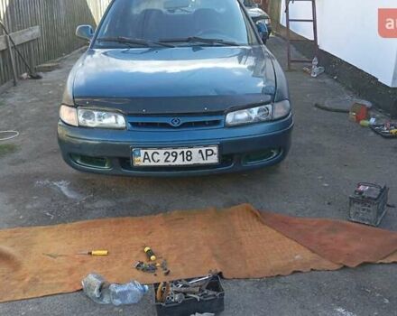 Зеленый Мазда 626, объемом двигателя 2 л и пробегом 200 тыс. км за 1500 $, фото 1 на Automoto.ua