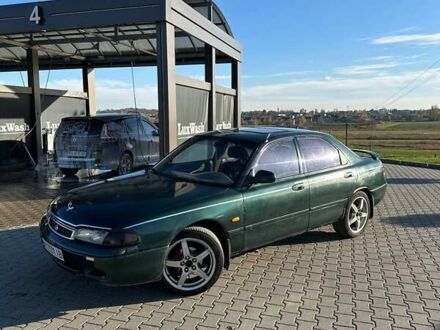 Зеленый Мазда 626, объемом двигателя 2 л и пробегом 300 тыс. км за 1300 $, фото 1 на Automoto.ua