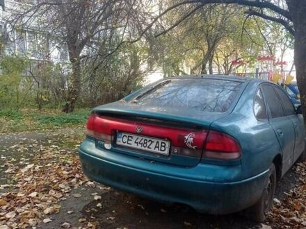 Зеленый Мазда 626, объемом двигателя 1.8 л и пробегом 400 тыс. км за 1200 $, фото 1 на Automoto.ua