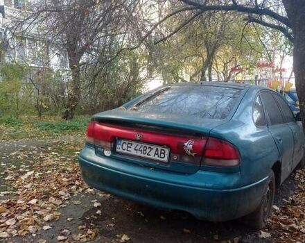 Зеленый Мазда 626, объемом двигателя 1.8 л и пробегом 400 тыс. км за 1200 $, фото 1 на Automoto.ua