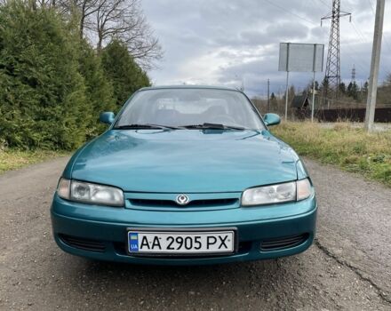 Зеленый Мазда 626, объемом двигателя 2 л и пробегом 295 тыс. км за 1750 $, фото 1 на Automoto.ua