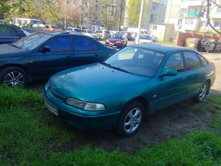 Зеленый Мазда 626, объемом двигателя 2 л и пробегом 335 тыс. км за 2700 $, фото 1 на Automoto.ua