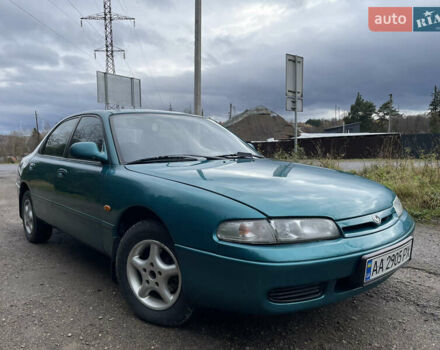 Зеленый Мазда 626, объемом двигателя 2 л и пробегом 401 тыс. км за 1750 $, фото 1 на Automoto.ua