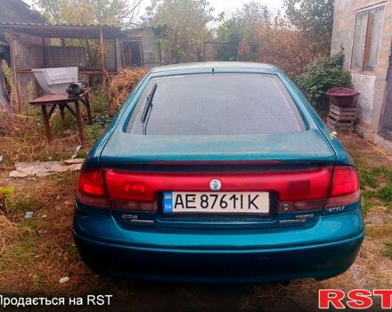 Мазда 626 1996 в Новомосковске на Automoto.ua Зеленый Мазда 626, объемом двигателя 1.8 л и пробегом 150 тыс. км за 2400 $, фото 1 на Automoto.ua