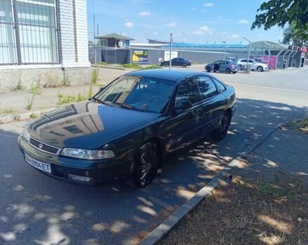 Зелений Мазда 626, об'ємом двигуна 2 л та пробігом 250 тис. км за 673 $, фото 1 на Automoto.ua