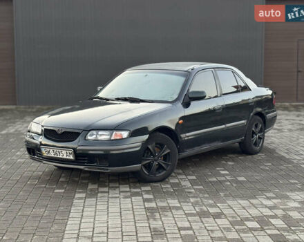 Зеленый Мазда 626, объемом двигателя 2 л и пробегом 309 тыс. км за 2100 $, фото 1 на Automoto.ua