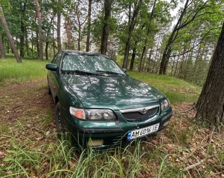 Зеленый Мазда 626, объемом двигателя 2 л и пробегом 300 тыс. км за 1200 $, фото 1 на Automoto.ua