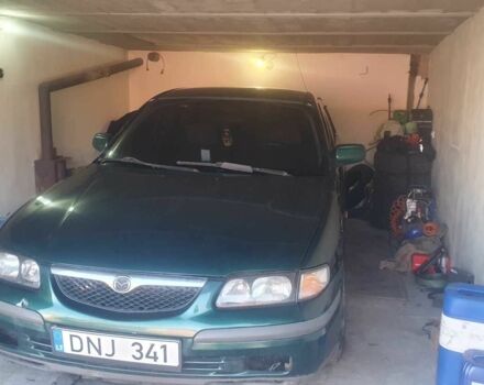 Зеленый Мазда 626, объемом двигателя 1.9 л и пробегом 382 тыс. км за 600 $, фото 1 на Automoto.ua