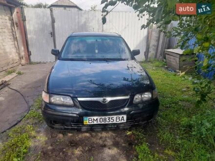Зеленый Мазда 626, объемом двигателя 2 л и пробегом 387 тыс. км за 2500 $, фото 1 на Automoto.ua
