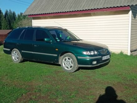 Мазда 626 1998 у Долине на Automoto.ua Зелений Мазда 626, об'ємом двигуна 2 л та пробігом 285 тис. км за 1200 $, фото 1 на Automoto.ua