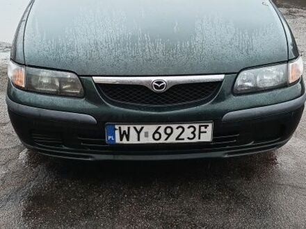 Зеленый Мазда 626, объемом двигателя 2 л и пробегом 320 тыс. км за 1800 $, фото 1 на Automoto.ua