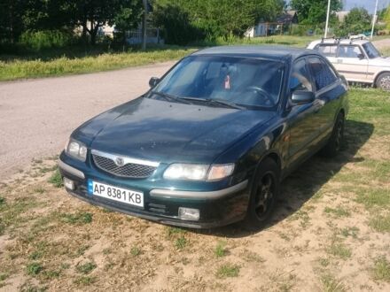 Зеленый Мазда 626, объемом двигателя 2 л и пробегом 350 тыс. км за 2200 $, фото 1 на Automoto.ua