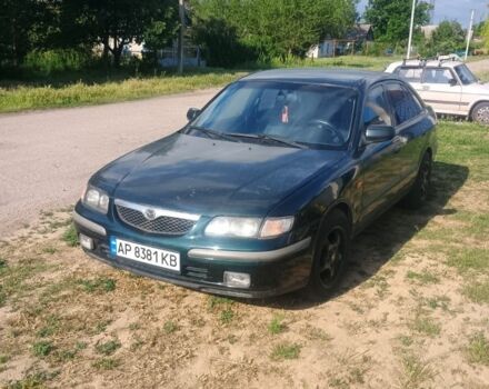 Зеленый Мазда 626, объемом двигателя 2 л и пробегом 350 тыс. км за 2200 $, фото 1 на Automoto.ua