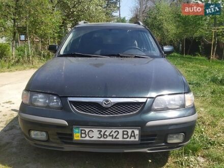 Зеленый Мазда 626, объемом двигателя 2 л и пробегом 327 тыс. км за 1470 $, фото 1 на Automoto.ua
