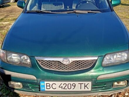 Зеленый Мазда 626, объемом двигателя 2 л и пробегом 340 тыс. км за 1900 $, фото 1 на Automoto.ua