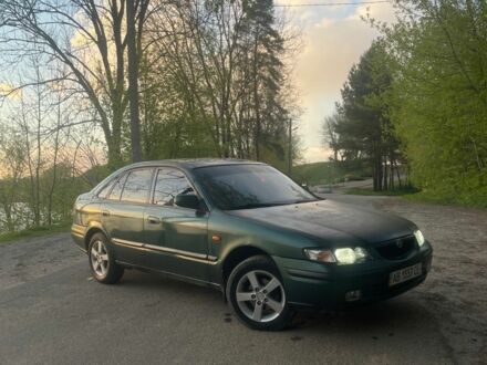 Зелений Мазда 626, об'ємом двигуна 2 л та пробігом 240 тис. км за 1900 $, фото 1 на Automoto.ua