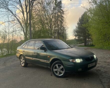 Зеленый Мазда 626, объемом двигателя 2 л и пробегом 240 тыс. км за 1900 $, фото 1 на Automoto.ua