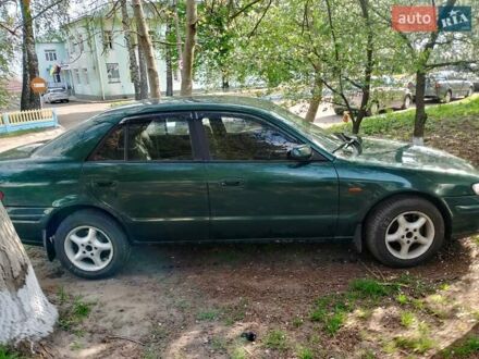 Зелений Мазда 626, об'ємом двигуна 2 л та пробігом 300 тис. км за 1500 $, фото 1 на Automoto.ua