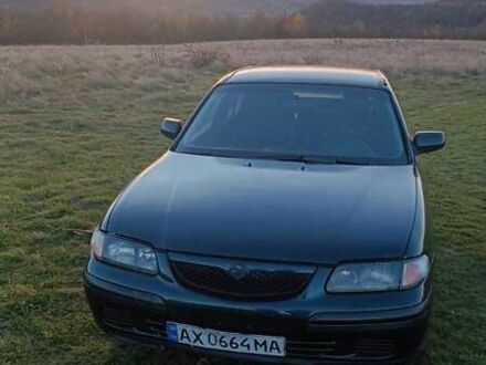 Зеленый Мазда 626, объемом двигателя 1.99 л и пробегом 480 тыс. км за 800 $, фото 1 на Automoto.ua